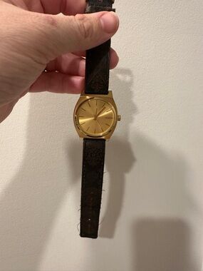 Nixon Gold Dial Watch with Dark Brown Leather Strap